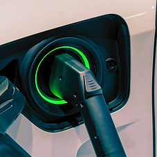 Electric car charging symbolising Rezii’s plug and play support for real estate agents.