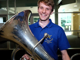 BASS PLAYER, THE SPIRIT OF CHRISTMAS, AND DESIGNER?