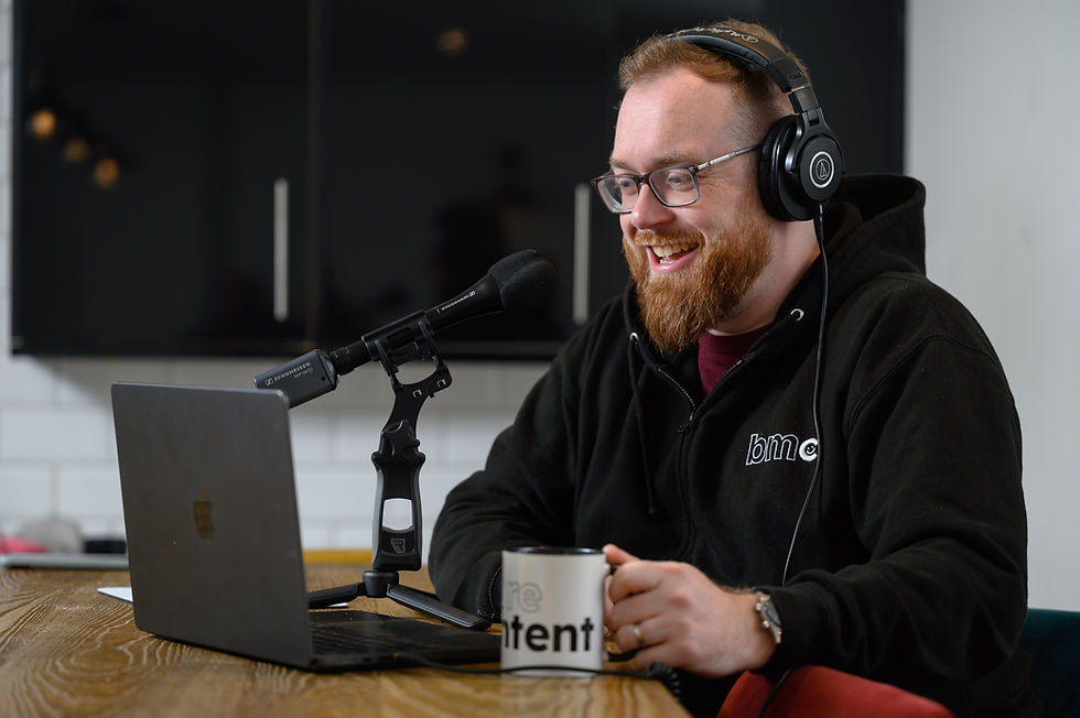 DREW PODCASTING TO THE LEFT.jpg