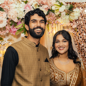 a man and a woman are posing for a picture 