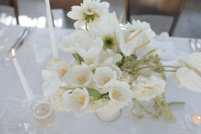 Modern green table centerpiece with white tulips