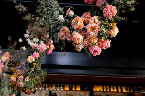 Modern hanging peony garlands at Rupert on Rupert wedding