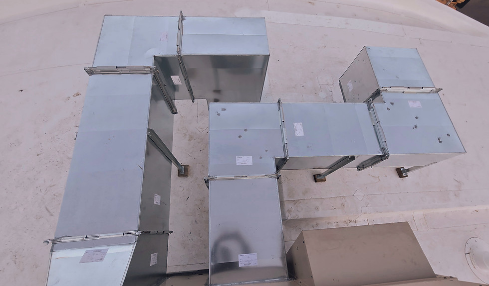 Custom HVAC Ductwork Fabrication installation on rooftop in the Black Hills.