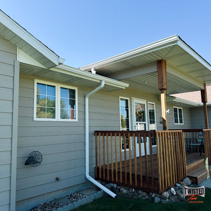 Gray house with white gutters
