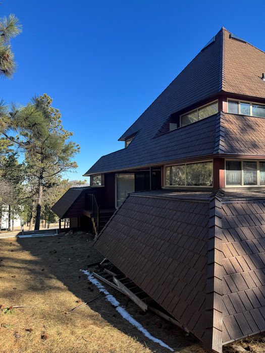 Custom gutters on multi level roofline
