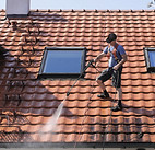 Professional roof cleaning service to remove moss, dirt, and debris.