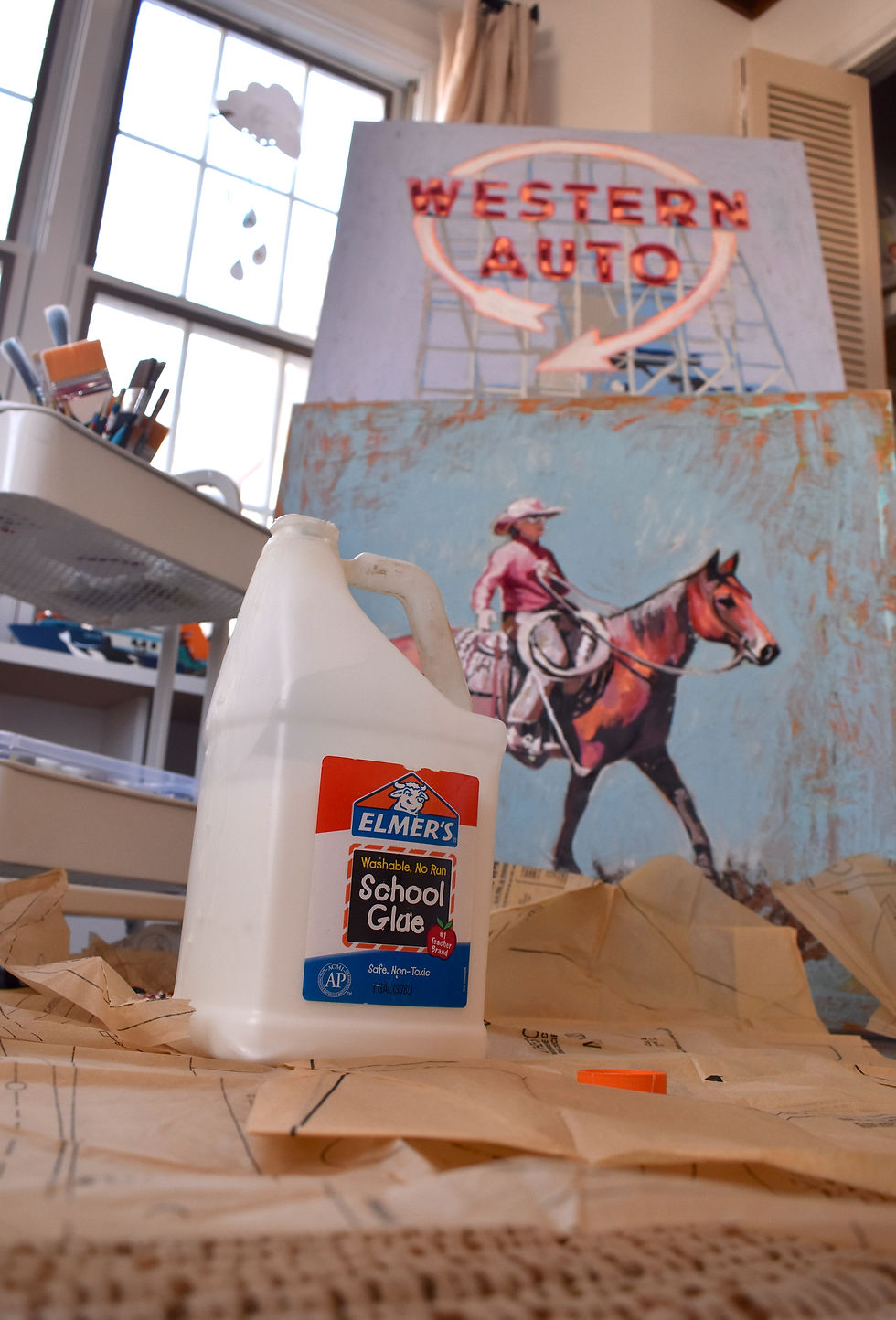 Ervin is not precious about her materials. Elmer's glue works just fine for her.