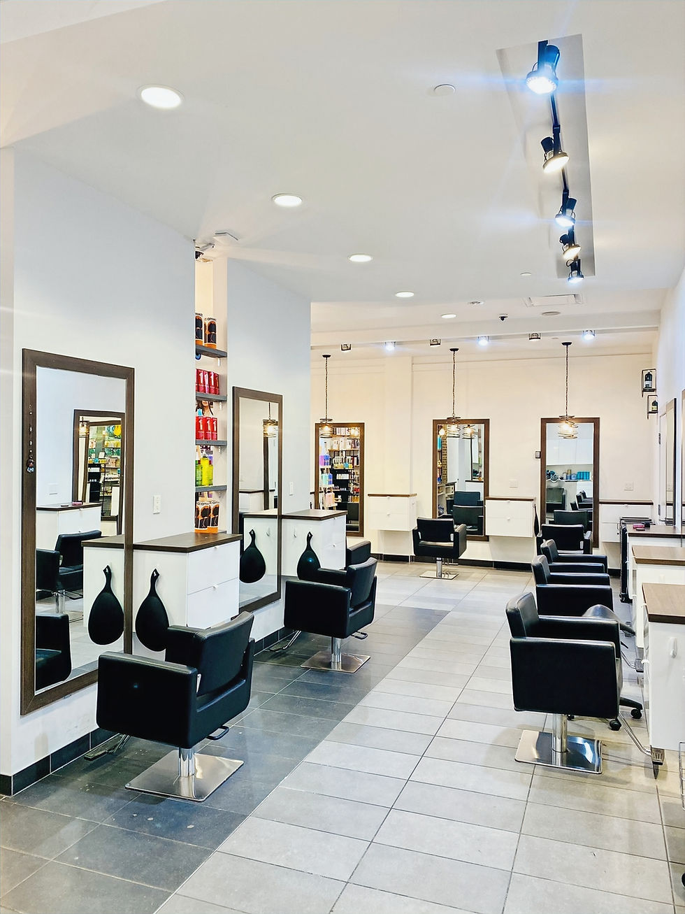 Eye-level view of a modern hair salon interior with stylish chairs and mirrors