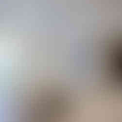 Double-volume luxury house Pattaya living room with Scandinavian Hygge design and natural lighting.