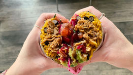 Chicken tinga burrito with black beans and pico ded gallo salsa in heart shape