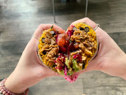 Chicken tinga burrito with black beans and pico ded gallo salsa in heart shape