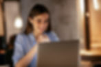 woman-smiling-at-computer