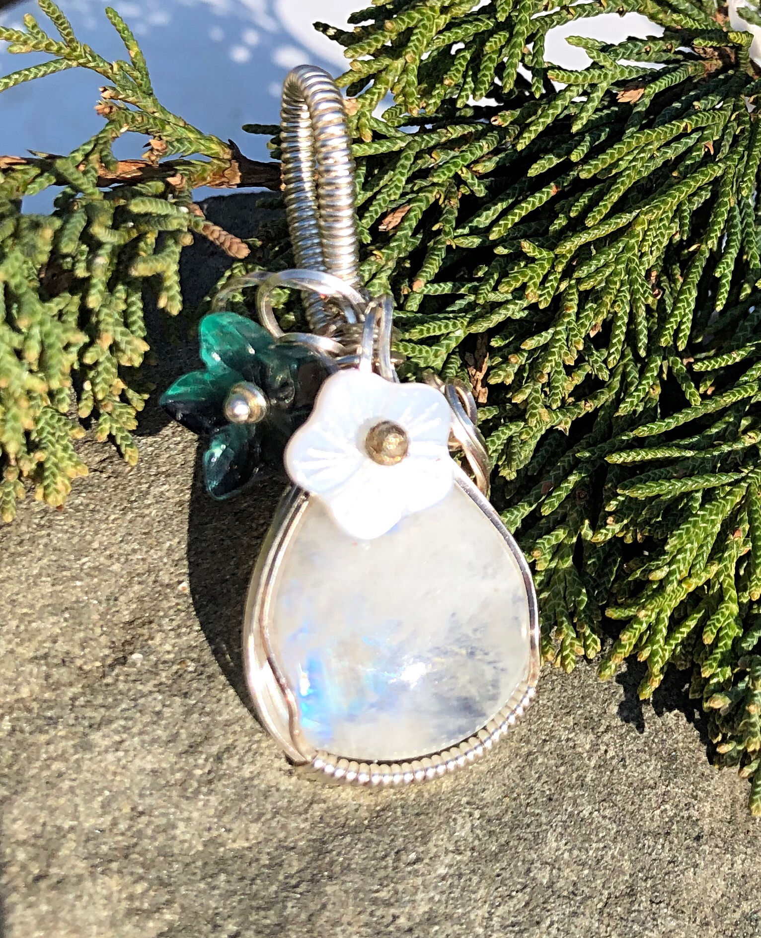 Rainbow Moonstone with green glass and shell flowers 
