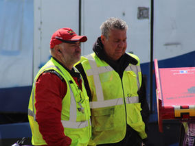 Stoxkarts officials and marshals working at a short oval race meeting