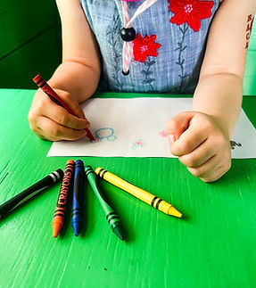 a child drawing with scissors_edited.jpg