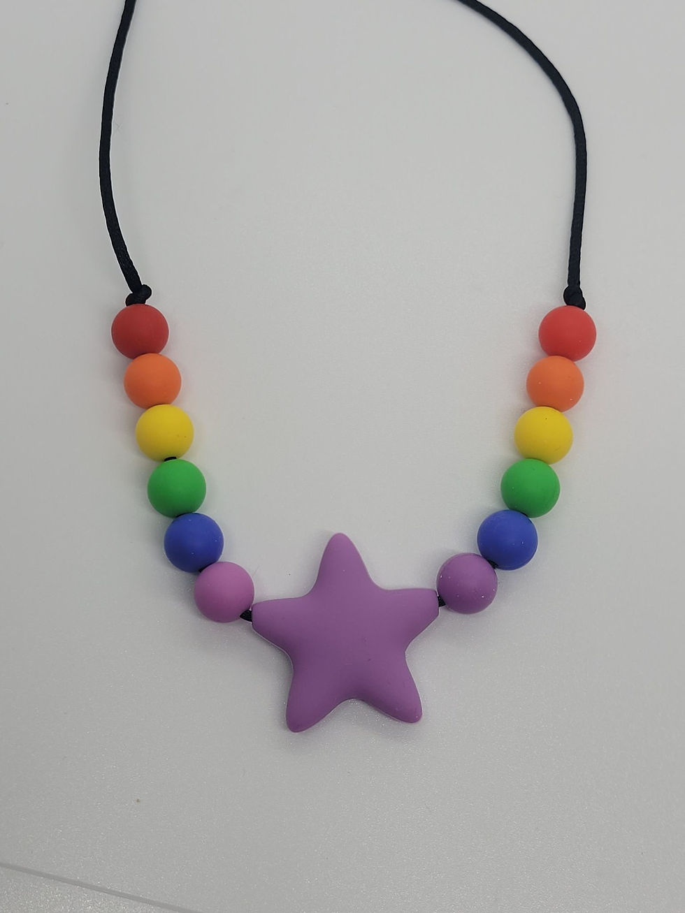 Thumbnail: Rainbow Smooth Star Chewable Necklace - 6 Color Options!