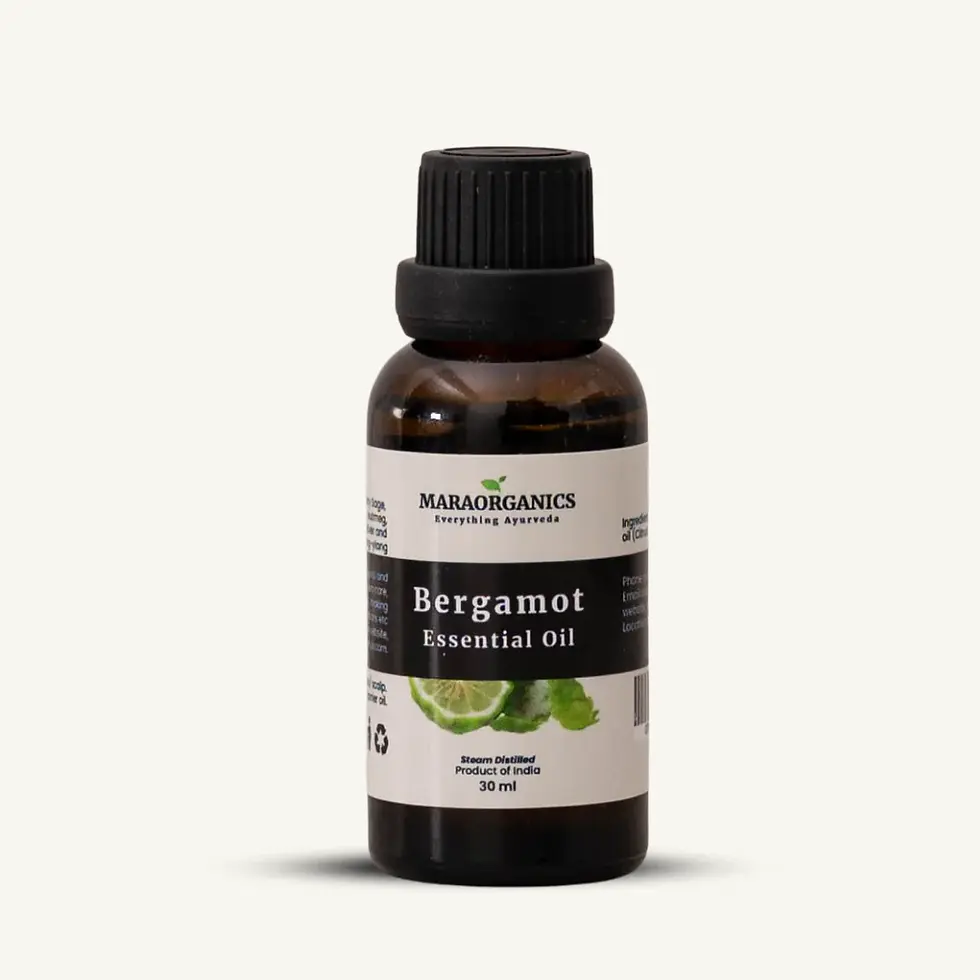 Bergamot Essential Oil bottle with label; product details and branding visible.