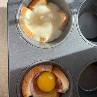Sunday Morning Egg Cups - add the egg and the sauce