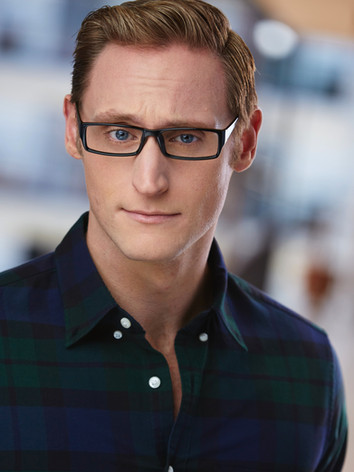 Nathaniel Dolquist headshot glasses
