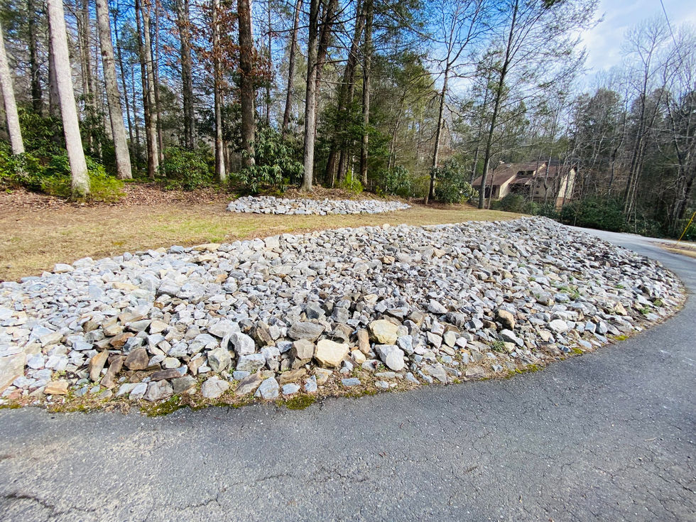 Seasonal cleanup removing leaves and debris from slope in Marion NC