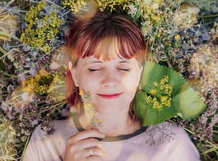 Happy woman in the flower field._edited.jpg