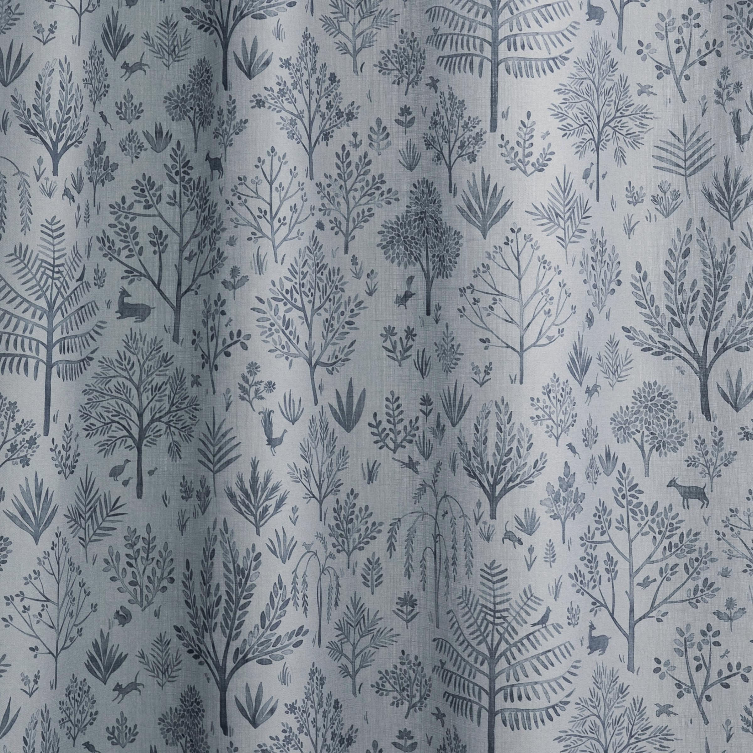 woodland pattern with trees deer animals dark blue