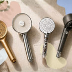 Comparison of filtered shower heads including Sia, Curo, Magichome and MEKO arranged on a countertop