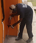 kerry - Termite operator drilling a pavement area