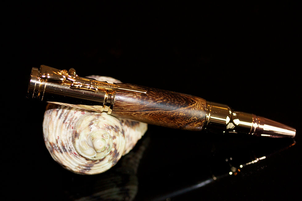 Thumbnail: Mini Bolt Action Bullet Pen in Padauk Wood.