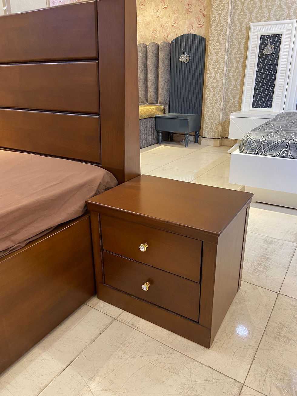 Thumbnail: Brown bed in matt finish with simple grooves.