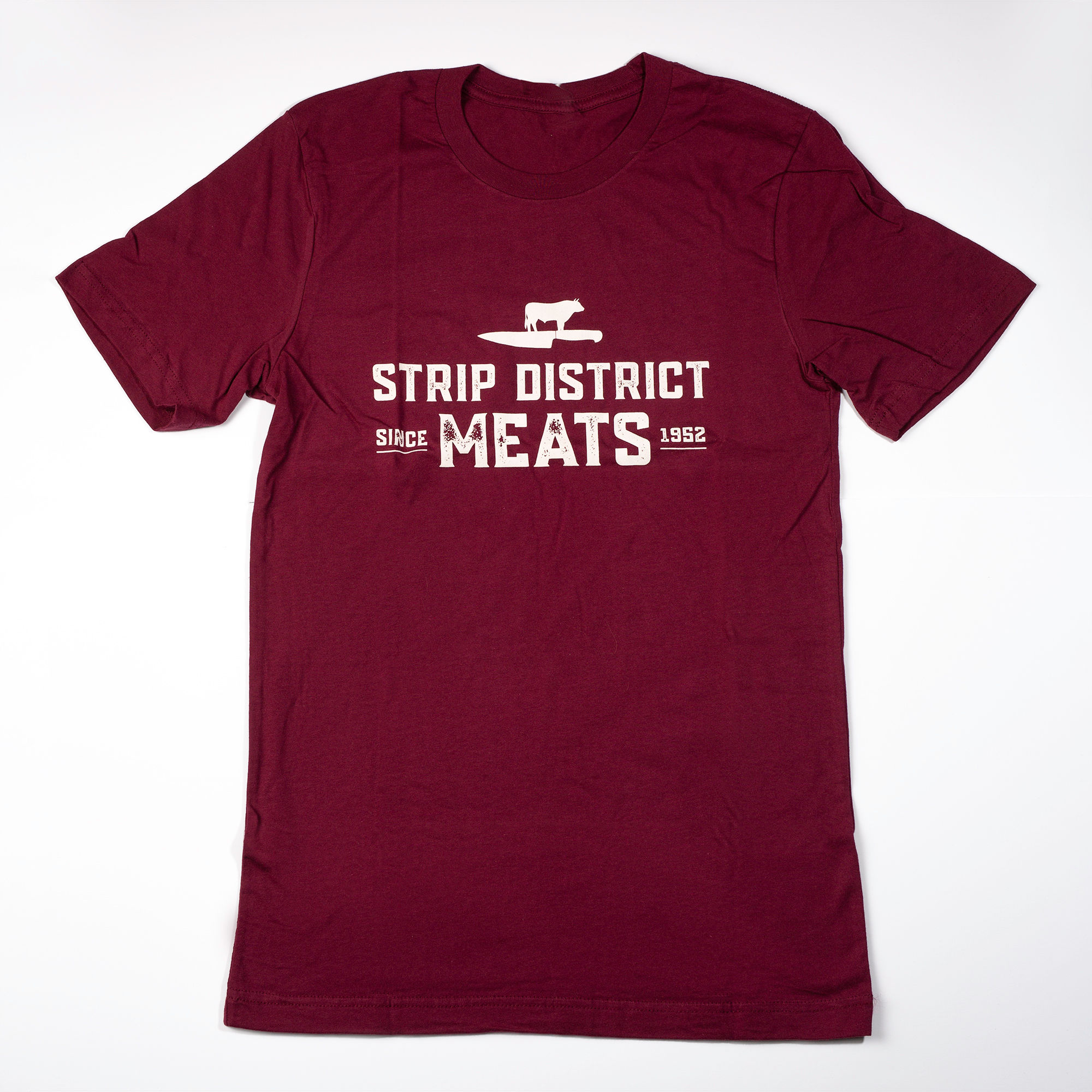 Short sleeve maroon t-shirt with company logo on the front.