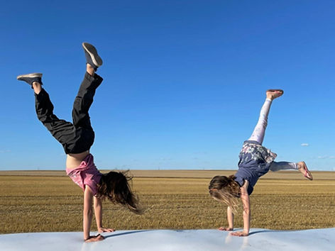 Kids doing gymnastics at Dutton Farms