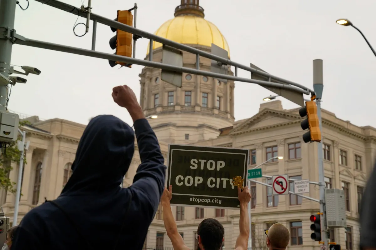 A protestor holding a fist