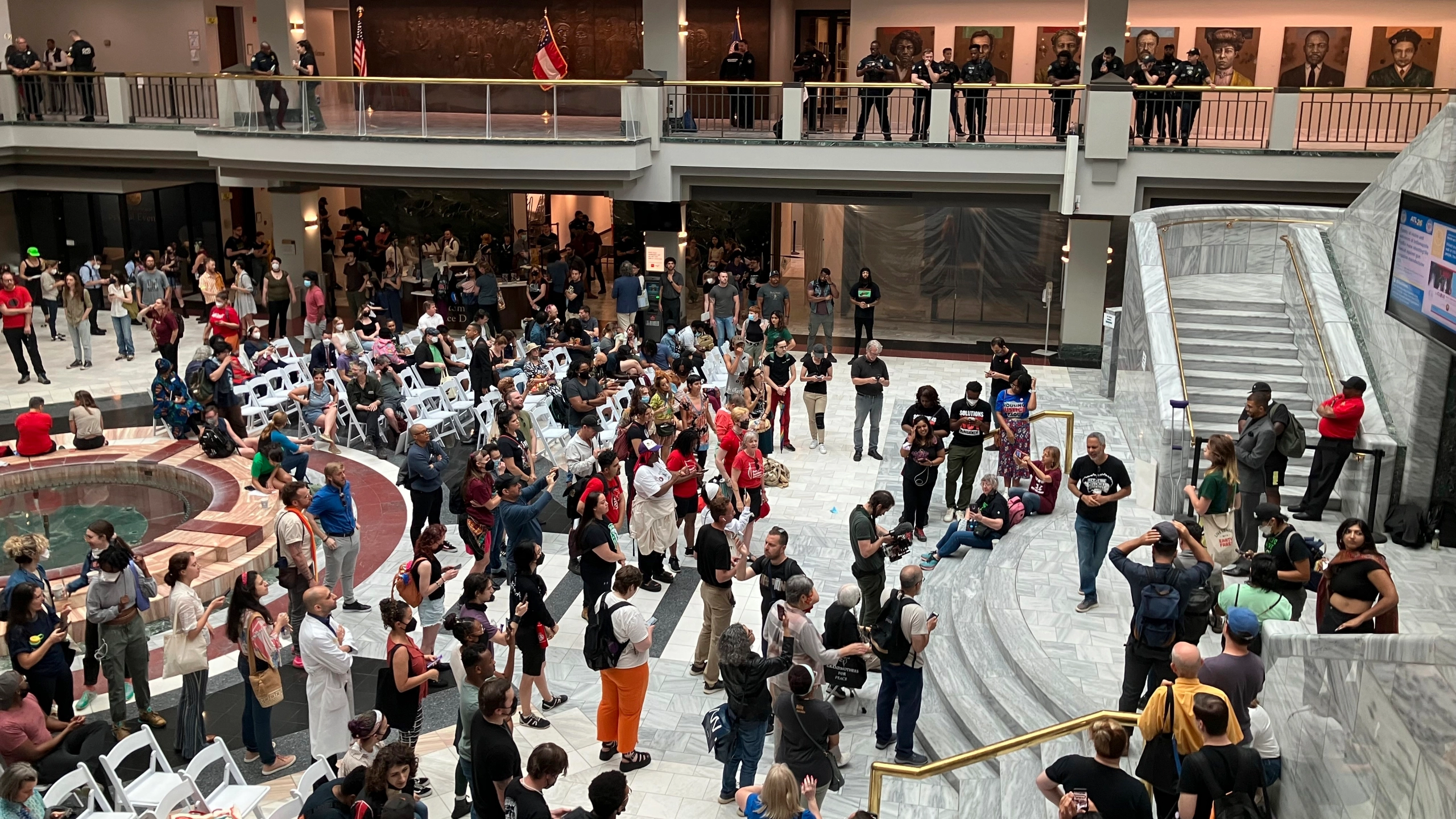 A large room full of protestors against Cop City Atlanta