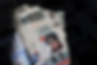 A newspaper with a cover picture of Mahsa Amini, a woman who died after being arrested by the Islamic republic's "morality police" is seen in Tehran, Iran September 18, 2022. Majid Asgaripour/WANA