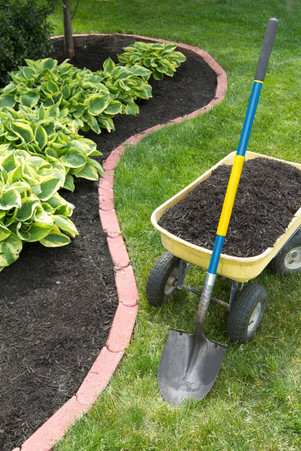 Hardscape Installation with Flowers and Mulch