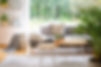 wooden-tables-in-front-of-grey-sofa-with-cushions-2021-08-26-15-45-43-utc.jpg