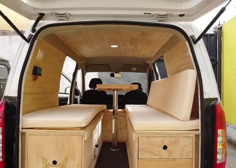 Inside view of customized minivan camper interior