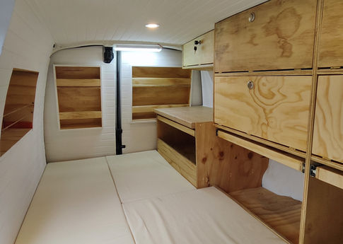 Inside view of customized minivan camper interior