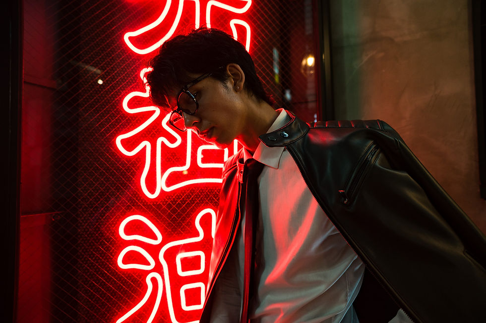 Tokyo photographer captures a man in red neon light
