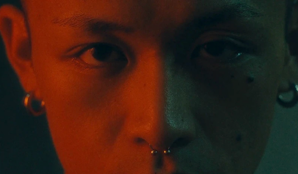 Tokyo photographer portrait of man with nose and ear piercings