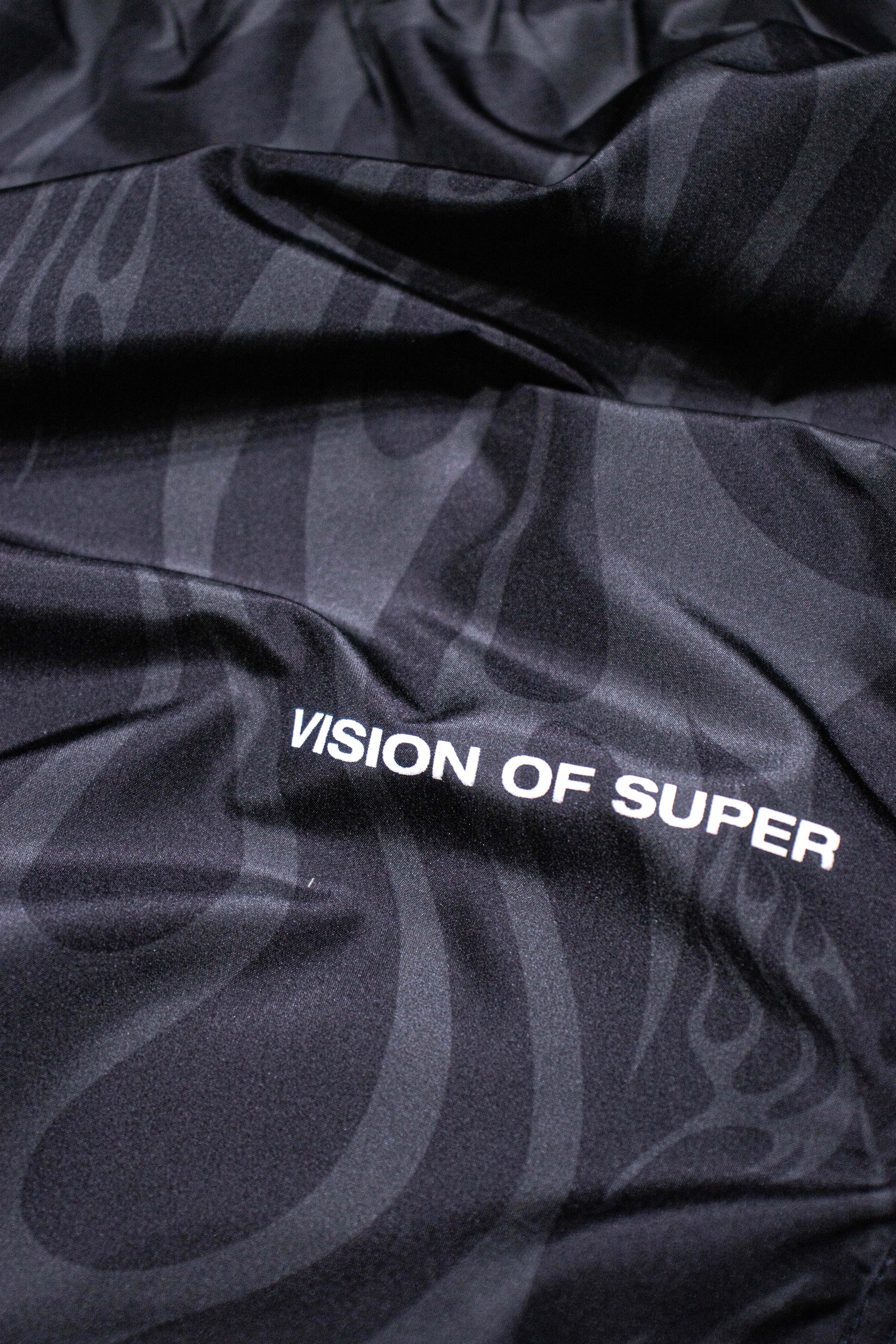 Vải đen họa tiết sóng lửa bộ lạc, chữ VISION OF SUPER.