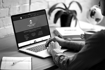 mockup-of-a-man-working-on-his-macbook-at-home-3832-el1_edited.png