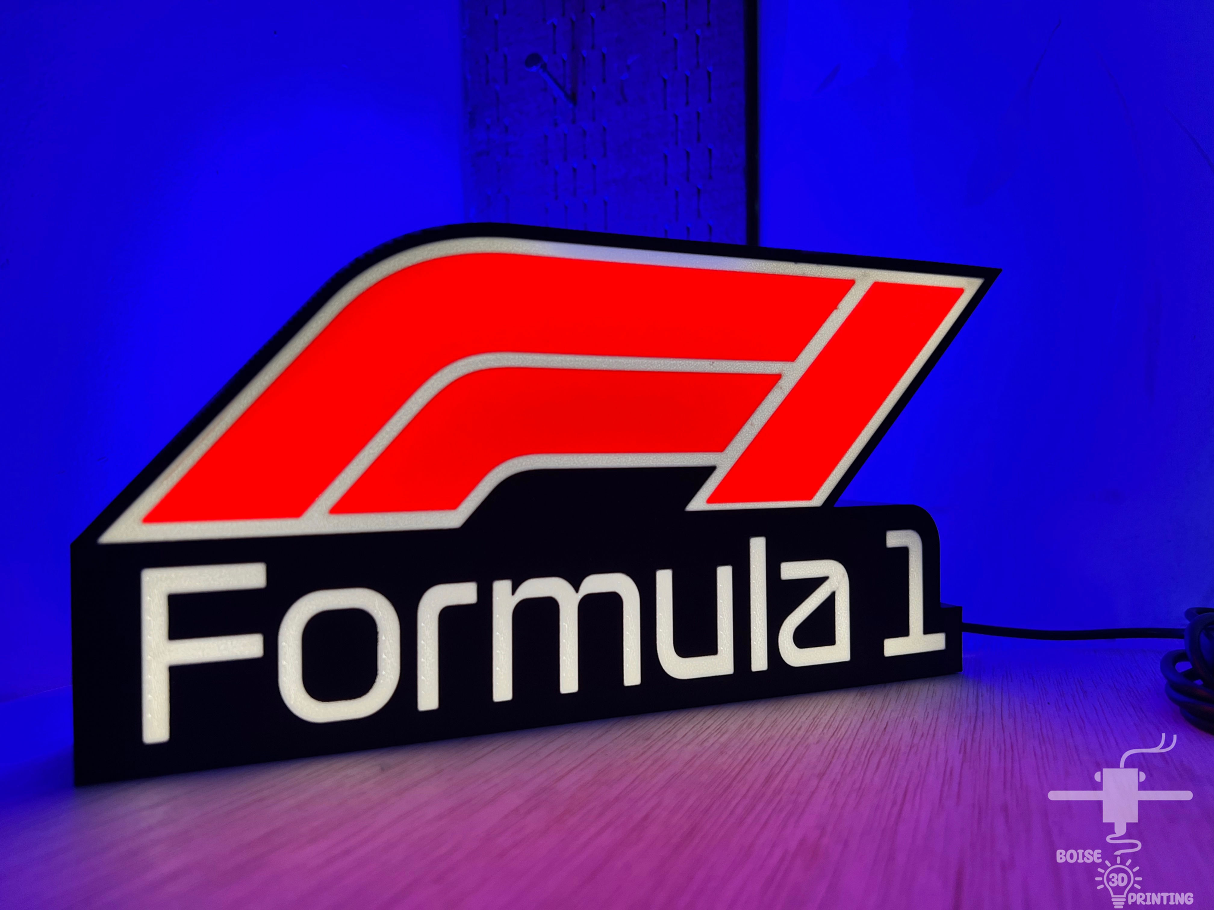 Formula 1 LED light box 3D printed by Boise 3D Printing featuring red and white racing logo