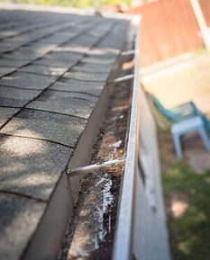 132038162-clean-gutter-after-clearing-of-dried-leaves-and-dirty.jpg