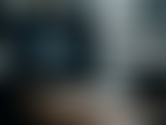 Ultra-realistic image of a computer screen displaying AI circuitry with text 'AI in Omnichannel Sales Strategy Optimization', set in a modern office environment with silhouetted figure, symbolizing artificial intelligence integration in omnichannel sales strategies for business technology