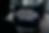 Ultra-realistic high-resolution image of a faceless person working on a laptop displaying the title 'How Natural Language Processing (NLP) Is Revolutionizing Sales Emails' in bold text, set in a modern office with natural lighting and minimalist background.