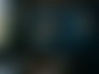 Ultra-realistic high-resolution image of a business meeting room with a large digital screen displaying XGBoost sales conversion prediction charts, including lead scoring, demo conversions, feature importance, and predicted conversion rate, with a silhouetted person viewing data on a laptop in a modern office setting.