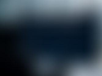 AI sales assistant dashboard on desktop screen showing sales overview, revenue, leads, deals, and activity analytics, with faceless silhouette of person in modern office setting overlooking city skyline