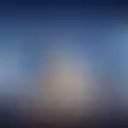 Ultra-realistic “Knowledge Base Software” hero image with laptop, books, and FAQ icons.